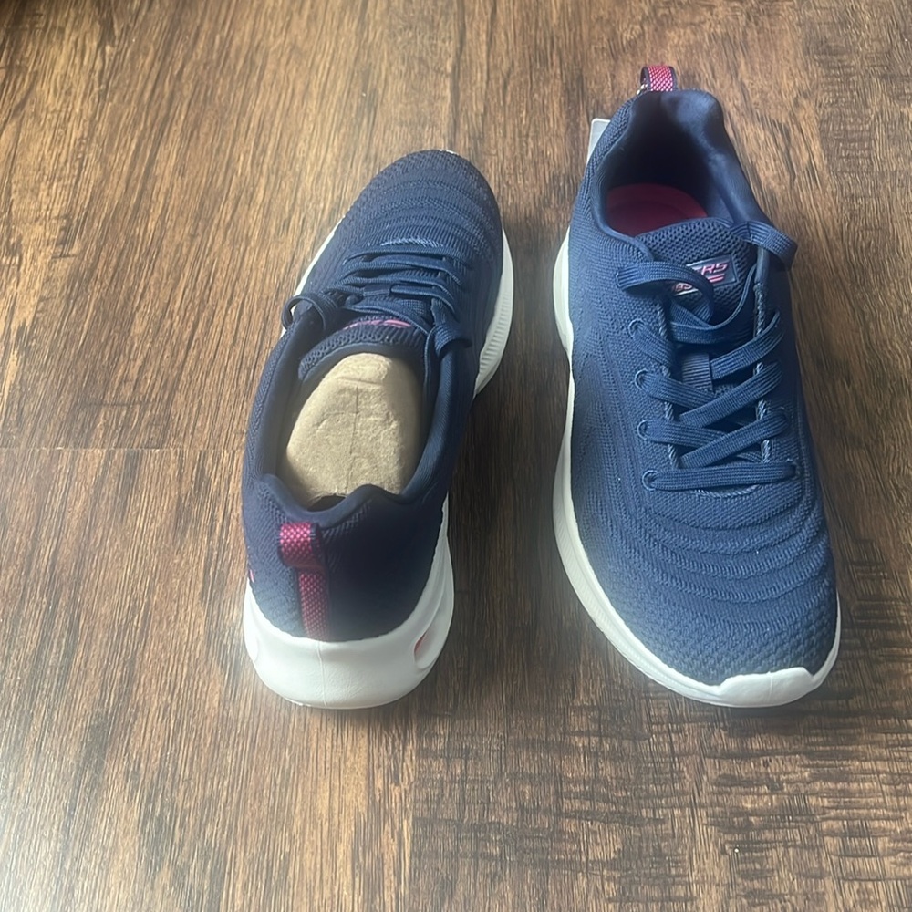 Skechers Navy blue sneakers/never worn/ size 6 w/memory foam/ machine washable.